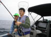 Mr Yoshiyuki Isobe reeling in a Laker on the Johnson rod