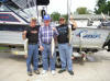 Royce Williams, Gene Williams, and John Bedwell with some of the day's Lake Trout catch