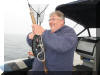 John Mekeel reeling in a Laker on the Johnson rod.