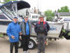 Erkki Kahkonen, Veli Hihonen, and Jarmo Huttenen with Lake Trout.