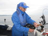 Veli Vihonen reeling a Lake Trout in on the Johnson Rod.