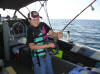 Brandon Coron reeling a Laker in on the Johnson rod